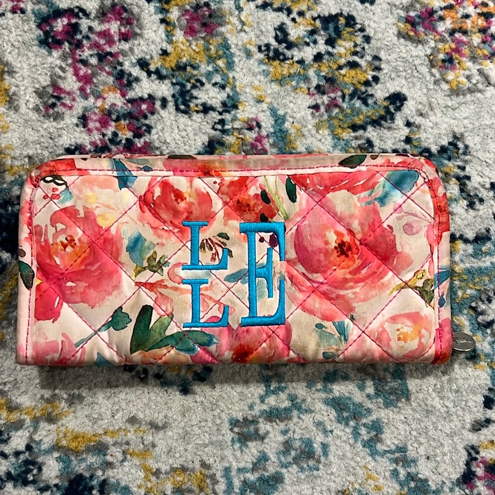 Initials Inc floral wristlet